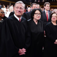 Chief Justice John Roberts, from front row left, Justice Sonia Sotomayor, Justice Elena Kagan, Justice Neil Gorsuch, Justice Brett Kavanaugh, and in back row left, Justice Ketanji Brown Jackson, arrive before President Joe Biden delivers the State of the Union address to a joint session of Congress at the Capitol on March 7, 2024.