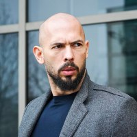Online influencer Andrew Tate detained in Romania, handed U.K. arrest warrant, his spokesperson says.