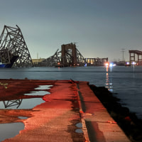 The collapsed Francis Scott Key Bridge in Baltimore, Md., on March 26, 2024.