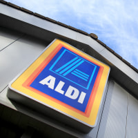 An exterior view of signage at a branch of the budget supermarket Aldi.