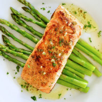 Grilled salmon on asparagus