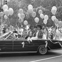 Members of the New York City Central Labor Council ride in a convertible during the Labor Day parade in 1982.