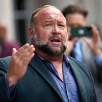 Alex Jones speaks to the media