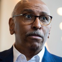 Former RNC chair Michael Steele; MAGA hat.