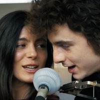 Monica Barbaro as Joan Baez and Timothée Chalamet as Bob Dylan in "A Complete Unknown."