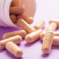 Nutritional supplement on a purple background.