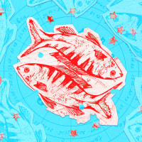 Paper cutouts of the Pisces zodiac on a blue background