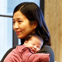 Mayor Michelle Wu returned to work at City Hall Tuesday, toting new baby, Mira