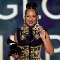 Alicia Keys accepts the Dr. Dre Global Impact Award onstage during the 67th Annual GRAMMY Awards.