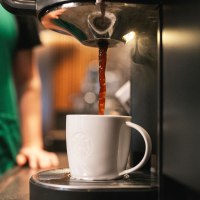 Coffee being poured at Starbucks.