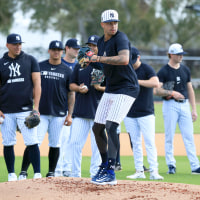 New York Yankees Pitcher Devin Williams (38) throws over to first base during the spring training workout.