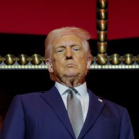 President Donald Trump stands at the presidential box at the Kennedy Center in Washington