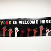 Everyone is welcome here sign