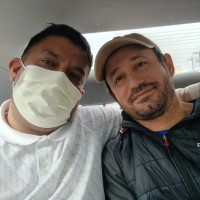 José Alfredo Pacheco, left, with his brother José Gregorio González.