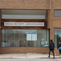 People enter a Social Security Administration office in suburban Detroit on March 7, 2025.  