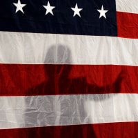 Shadow of a political candidate on a flag
