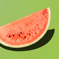 Fresh watermelon on the green background.