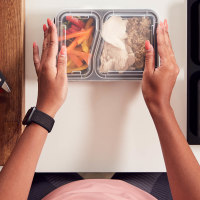 Woman making healthy meals at home.