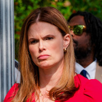 Allison Riggs at a protest against her opponent's efforts to toss out scores of ballots 