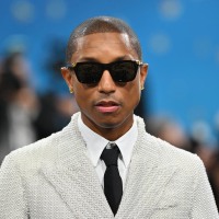 Pharrell Williams arrives at the 2025 Met Gala.