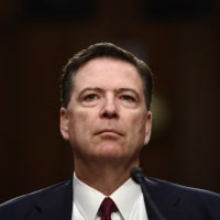 James Comey arrives to testify