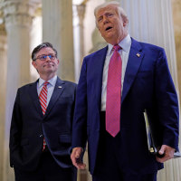 President Donald Trump and House Speaker Mike Johnson arrive for a House Republican caucus meeting on Tuesday, May 20, 2025. 