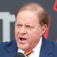 Aug 3, 2024; Canton, OH, USA;  Master of Ceremonies Chris Berman speaks at the Class of 2024 Pro Football Hall of Fame enshrinement ceremony at Tom Benson Hall of Fame Stadium. Mandatory Credit: Charles LeClaire-Imagn Images
