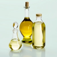 Cooking oils in bottles still life.