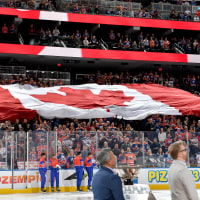 Edmonton Oilers fans unfurl a huge Canadian flag at game