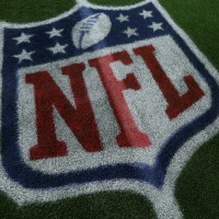 LAS VEGAS, NEVADA - DECEMBER 16: The NFL shield logo painted on the grass turf prior to the game between the Las Vegas Raiders and the Atlanta Falcons at Allegiant Stadium on December 16, 2024 in Las Vegas, Nevada. (Photo by Aaron M. Sprecher/Getty Images)