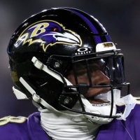 BALTIMORE, MARYLAND - JANUARY 11: Lamar Jackson #8 of the Baltimore Ravens looks to make a pass during a Wild Card Playoff Game against the Pittsburgh Steelers at M&T Bank Stadium on January 11, 2025, in Baltimore, Maryland. The Ravens defeated the Steelers 28-14. (Kara Durrette/Getty Images)