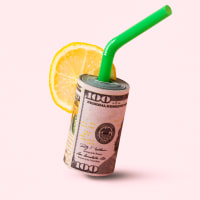 Money concept with a stack of banknotes as a cocktail, vacation, rest
