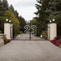 A gate with the number 23 seen outside