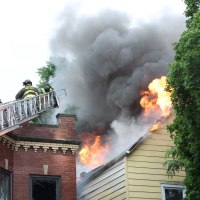 Three children were found stabbed in a burning building in Chicago’s Logan Square neighborhood on the Fourth of July, sources told NBC Chicago.