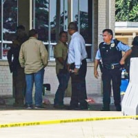 Officials work the scene of a shooting at a Border Patrol facility in McAllen, Texas, Monday, July 7, 2025. 