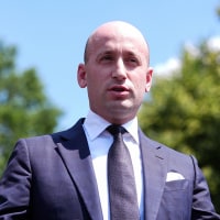 Stephen Miller speaks with reporters