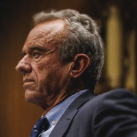 RFK Jr at a hearing; a inverted gloved hand holding a vaccination syringe.