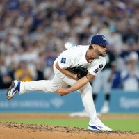 Clayton Kershaw of the Los Angeles Dodgers strikes out Vinny Capra of the Chicago White Sox during the sixth inning to record his 3,000th career strikeout at Dodger Stadium on Wednesday in Los Angeles, California.