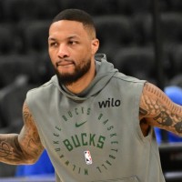 Mar 16, 2025; Milwaukee, Wisconsin, USA; Milwaukee Bucks guard Damian Lillard (0) warms up before game against the Oklahoma City Thunder at Fiserv Forum. Mandatory Credit: Benny Sieu-Imagn Images