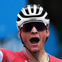 GUALDO TADINO, ITALY - MARCH 12: Arrival / Mathieu Van Der Poel of Netherlands and Team Alpecin-Fenix Celebration & Wout Van Aert of Belgium and Team Jumbo - Visma Blue Leader Jersey during the 56th Tirreno-Adriatico 2021, Stage 3 a 219km stage from Monticiano to Gualdo Tadino 532m / #TirrenoAdriatico / on March 12, 2021 in Gualdo Tadino, Italy. (Photo by Tim de Waele/Getty Images)