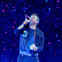 Chris Martin of Coldplay performing.