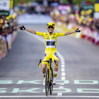 Pauline Ferrand-Prevot crosses the finish line on a bicycle
