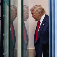 President Donald Trump arrives for a news conference 