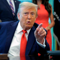 President Trump Signs Executive Orders In The Oval Office Of The White House