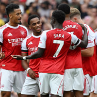 LONDON, ENGLAND - AUGUST 23: Jurrien Timber of Arsenal celebrates scoring his team's first goal with his teammates during the Premier League match between Arsenal and Leeds United at Emirates Stadium on August 23, 2025 in London, England. (Photo by David Price/Arsenal FC via Getty Images)