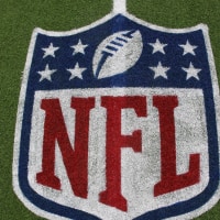 Jul 31, 2025; Canton, Ohio, USA; General view of the NFL shield logo on the field at the Tom Benson Hall of Fame Stadium site of the Professional Football Hall of Fame game and Class of 2025 induction ceremonies. Mandatory Credit: Charles LeClaire-Imagn Images