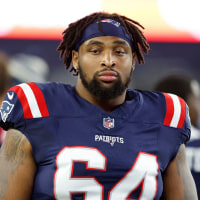 FOXBOROUGH, MA - AUGUST 08: New England Patriots guard Layden Robinson (64) on the sideline during the NFL preseason game between Washington Commanders and New England Patriots on August 8, 2025, at Gillette Stadium in Foxborough, MA. (Photo by M. Anthony Nesmith/Icon Sportswire via Getty Images)