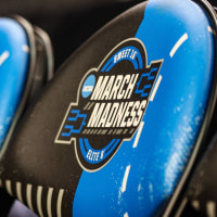 Mar 26, 2025; Newark, NJ, USA; General view of a NCAA March Madness logo on sideline seats during a practice sessions in preparation for an East Regional semifinal games at Prudential Center. Mandatory Credit: Vincent Carchietta-Imagn Images