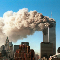 Image: Smoke pours from the twin towers of the World Trade Center after they were hit by two hijacked airliners in a terrorist attack Sept.11, 2001 in New York City.