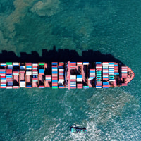 A container ship sails out of the port in Qingdao, China, on Sept. 4, 2025. 